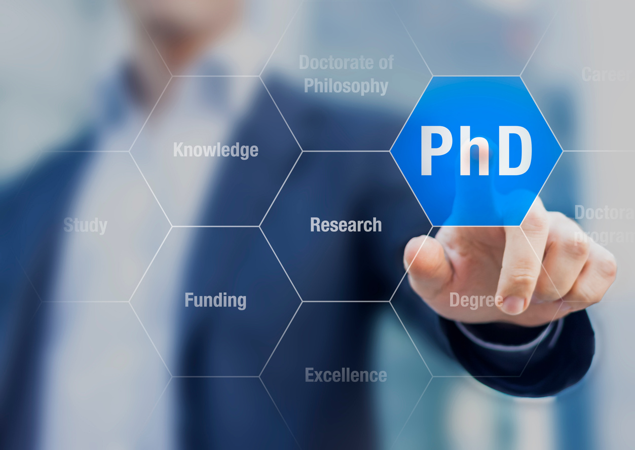 PhD student pushing button about Doctorate of Philosophy concept